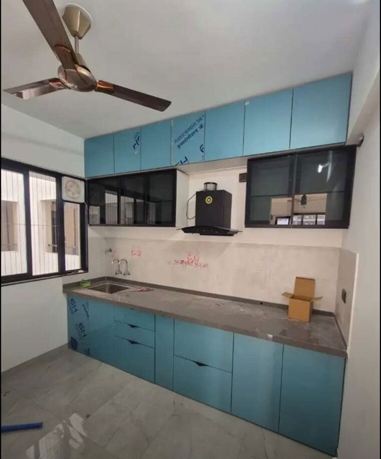 Kitchen, unique-youtopia 2 Bedroom 765 Sq.Ft. Apartment In Kharadi Pune 10080178
