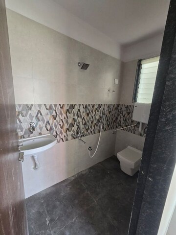 Bathroom in 2 BHK Apartment at Raj Tulsi Aagman, Badlapur East – for Rent