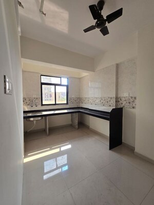 Kitchen in 2 BHK Apartment at Raj Tulsi Aagman, Badlapur East – for Rent