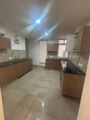 Kitchen in 2 BHK Apartment at Urban Axis Urban Woods, Sushant Golf City – for Rent