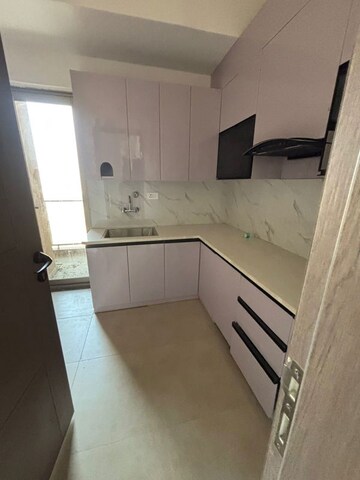 Kitchen in 2 BHK Apartment at Urban Axis Urban Woods, Sushant Golf City – for Rent