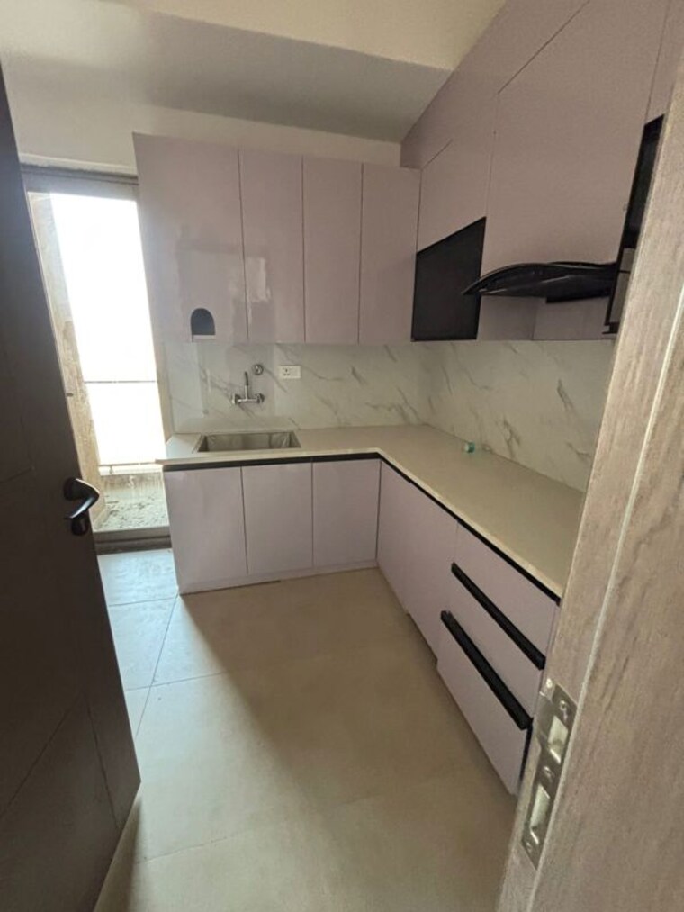 Kitchen, urban-axis-urban-woods 2 Bedroom 749 Sq.Ft. Apartment In Sushant Golf City Lucknow 10080456