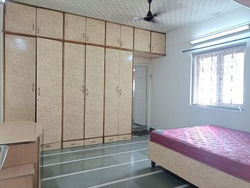 Bedroom in 2 BHK Apartment at Samruddhi Apartments, Camp – for Rent