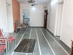 Living Room in 2 BHK Apartment at Samruddhi Apartments, Camp – for Rent