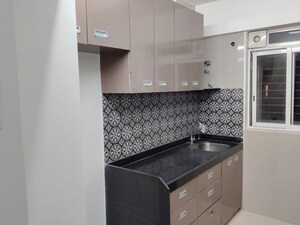 Kitchen in 1 BHK Apartment at Lodha Amara, Kolshet Road – for Sale