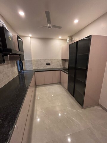 Kitchen in 4 BHK Builder Floor at Ansal API Versalia, Sector 67a – for Rent