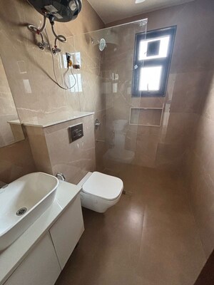 Bathroom in 4 BHK Builder Floor at Ansal API Versalia, Sector 67a – for Rent