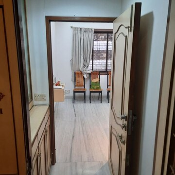 Balcony in 1 BHK Apartment at Prem Court CHS, Peddar Road – for Sale