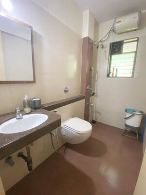 Bathroom in 2 BHK Apartment at Omkar Alta Monte, Malad East – for Sale