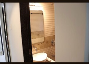 Bathroom in 2 BHK Apartment at Omkar Alta Monte, Malad East – for Sale