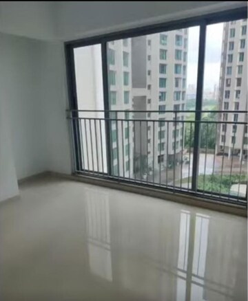 Living Room in 2 BHK Apartment at Kalpataru Parkcity Sunrise B, Kolshet Road – for Sale