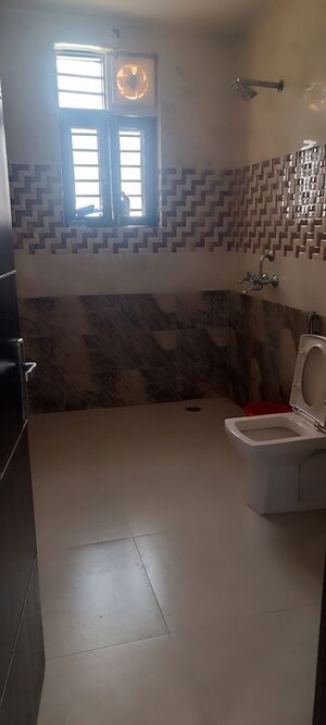 Bathroom in 2 BHK Builder Floor at The Emporium, Sector 110a – for Rent