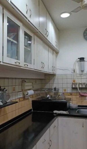 Kitchen in 3 BHK Apartment at Giriraj Apartments, Altamount Road – for Rent