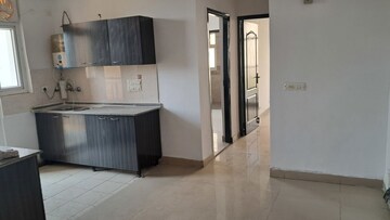 Building Lobby in 2.5 BHK Apartment at Amrapali Princely Estate, Sector 76 – for Sale