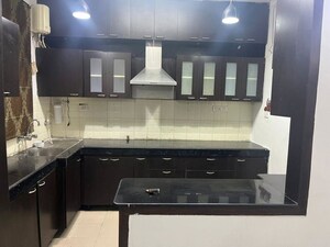 Kitchen in 2 BHK Apartment at Jaipuria Sunrise Green, Lohgarh – for Rent