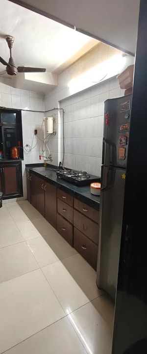 Kitchen in 2 BHK Apartment at Shiv Gauri, Malad West – for Rent