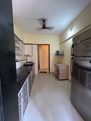 Kitchen in 2 BHK Apartment at Swapnalok Towers, Malad East – for Rent