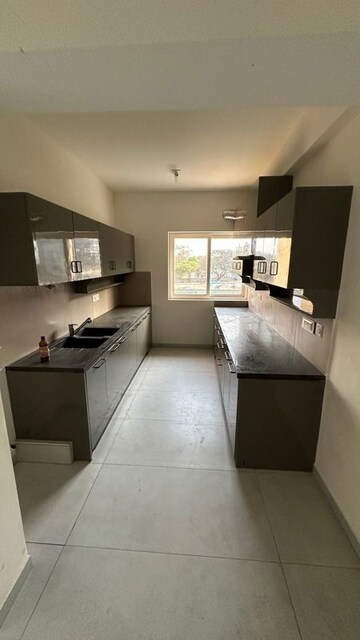 Kitchen in 2 BHK Apartment at Casagrand Boulevard, Hennur Road – for Rent