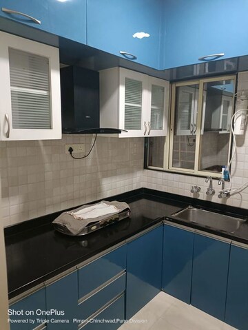 Kitchen in 2 BHK Apartment at Sai Dishti CHS, Ravet – for Rent