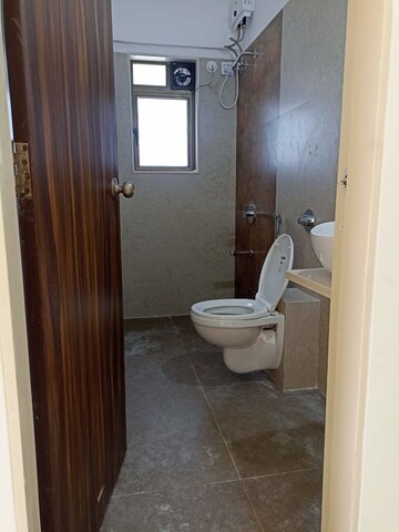 Bathroom in 3 BHK Apartment at Mallhar Bhimashankar Heights, Dahisar West – for Rent