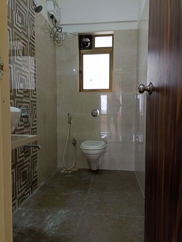 Bathroom in 3 BHK Apartment at Mallhar Bhimashankar Heights, Dahisar West – for Rent