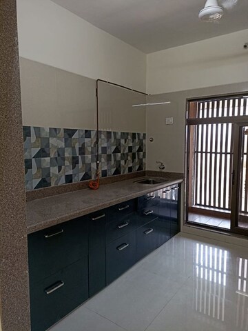 Kitchen in 3 BHK Apartment at Mallhar Bhimashankar Heights, Dahisar West – for Rent