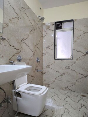 Bathroom in 3 BHK Apartment at Conwood Enclave, Vasant Vihar – for Rent