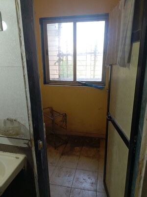 Bathroom in 1 BHK Apartment at Shanti Dham Apartment, Kalwa – for Rent