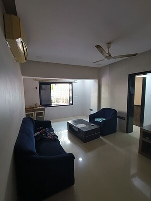 Master Bedroom in 1.5 BHK Apartment at Rupji Gulmohar, Andheri West – for Rent