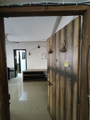 Kitchen in 1.5 BHK Apartment at Rupji Gulmohar, Andheri West – for Rent