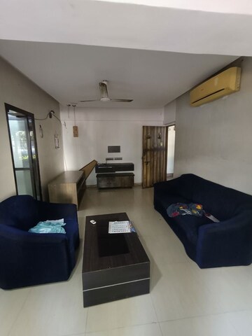 Living Room in 1.5 BHK Apartment at Rupji Gulmohar, Andheri West – for Rent