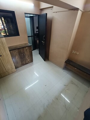 Room in 1.5 BHK Apartment at Rupji Gulmohar, Andheri West – for Rent