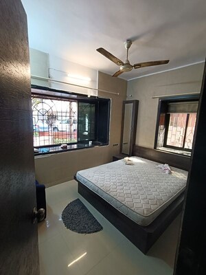 Bedroom in 1.5 BHK Apartment at Rupji Gulmohar, Andheri West – for Rent