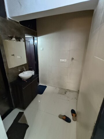 Bathroom in 1.5 BHK Apartment at Rupji Gulmohar, Andheri West – for Rent