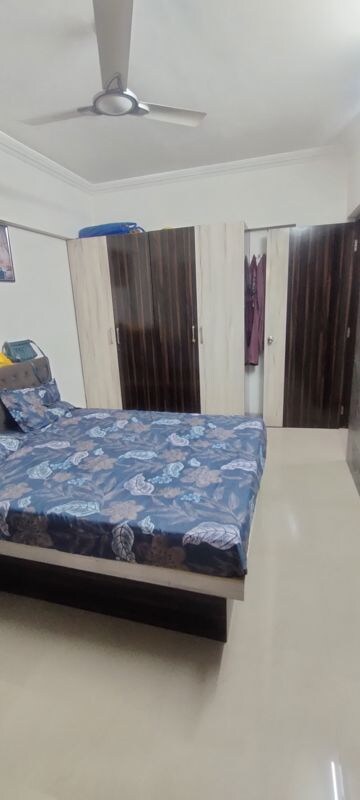Bedroom in 1 BHK Apartment at Sai Mangal Ajoy CHS, Kandivali West – for Sale