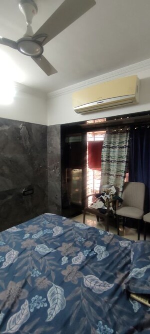 Living Room in 1 BHK Apartment at Sai Mangal Ajoy CHS, Kandivali West – for Sale