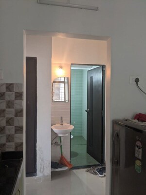 Living Room in 1 BHK Apartment at Haware Indraprastha Regency, Goregaon West – for Rent