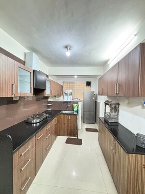 Kitchen in 2 BHK Apartment at Sukhwani Elmwood, Pimple Saudagar – for Rent