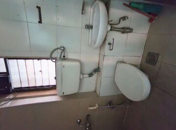 Bathroom in 1.5 BHK Apartment at Runwal Garden City, Balkum Pada – for Rent
