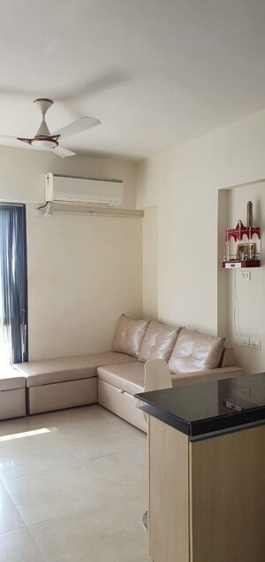 Living Room in 1 BHK Apartment at Aspen Park, Goregaon East – for Rent