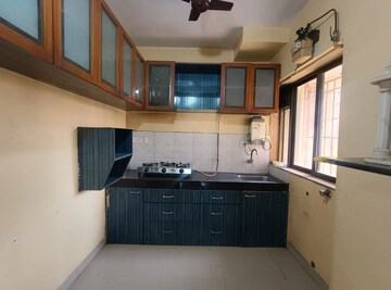 Kitchen in 1.5 BHK Apartment at Runwal Garden City, Balkum Pada – for Sale