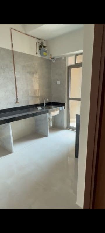 Kitchen in 2 BHK Apartment at Sheth Auris Bliss, Malad West – for Rent