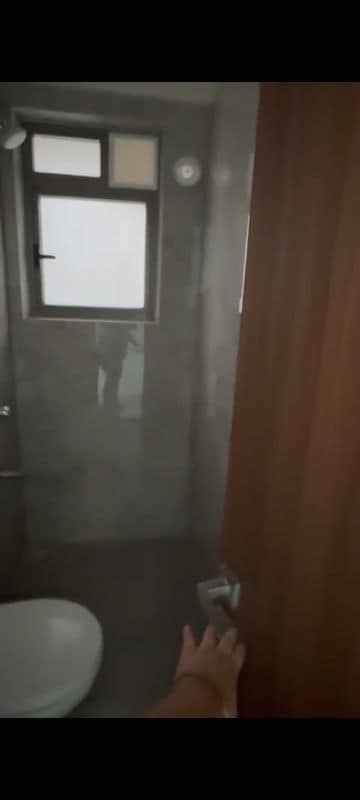 Bathroom in 2 BHK Apartment at Sheth Auris Bliss, Malad West – for Rent