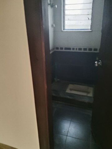 Bathroom in 1 BHK Apartment at Nirmal Kalpnagri Dhaivat, Mulund West – for Rent