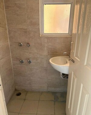 Bathroom in 1 BHK Apartment at Wave Dream Homes, Wave City – for Rent