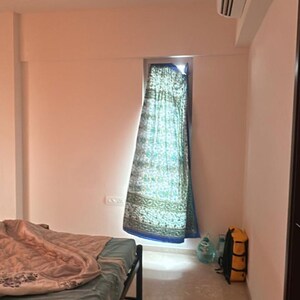 Living Room in 2 BHK Apartment at Piramal Vaikunth Vama, Ashok Nagar – for Rent