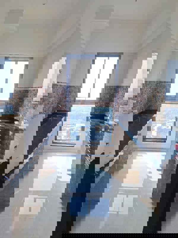 Kitchen in 2 BHK Apartment at Rajesh Raj Infinia, Malad West – for Rent