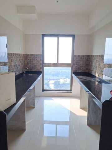 Kitchen in 2 BHK Apartment at Rajesh Raj Infinia, Malad West – for Rent