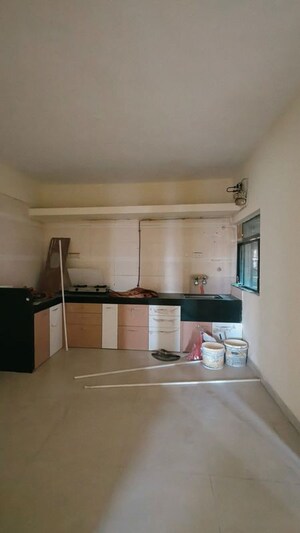 Kitchen in 3 BHK Apartment at Arun Sheth Sanskriti, Wakad – for Rent