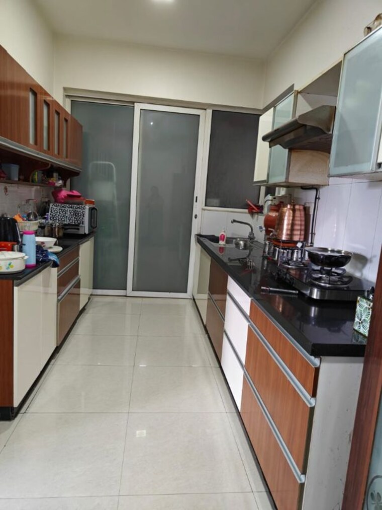 Kitchen, amanora-aspire-towerss 3 Bedroom 2000 Sq.Ft. Apartment In Hadapsar Pune 10084344
